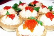 Tartlets: options for preparing a festive appetizer with caviar